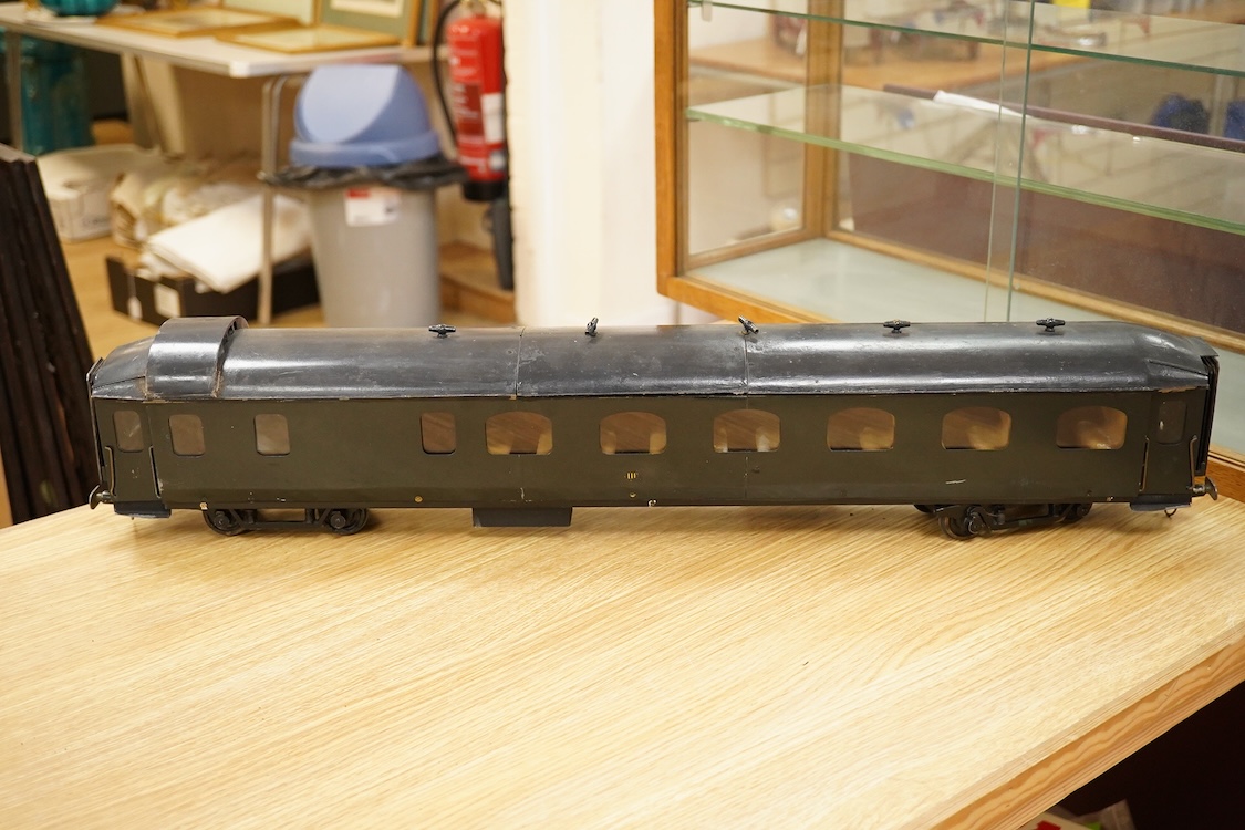 Four Gauge One Continental bogie coaches; two in very dark Green livery, and two ‘Trains Rapides Nord’ in dark green, including some scratch building and possible adaptation from kits